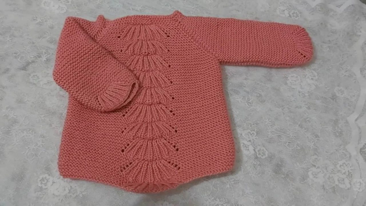 Pattern of a Broom Baby Sweater